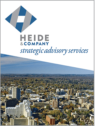 A brochure cover with an aerial view of the city.