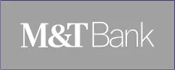 A gray and white logo for the t & t bank.